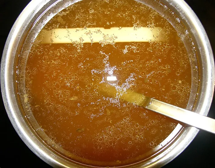 Studio macro photograph of beef broth