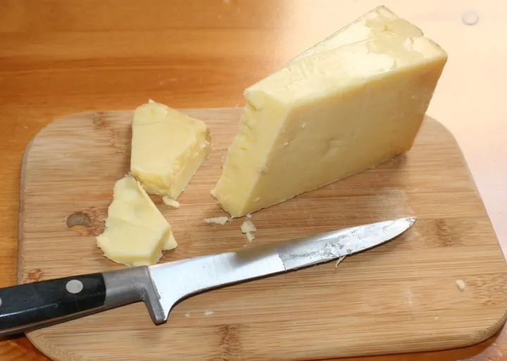Studio macro photograph of cheddar cheese