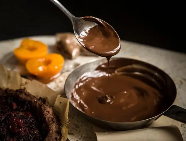 Studio macro photograph of chocolate sauce