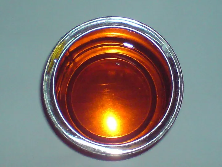 Studio macro photograph of golden syrup