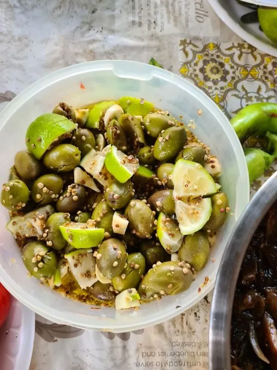 Studio macro photograph of green olives